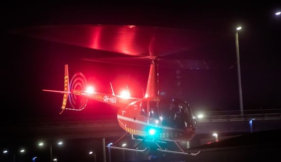 Kaukolämpöverkkoa kuvataan helikopterista. 
